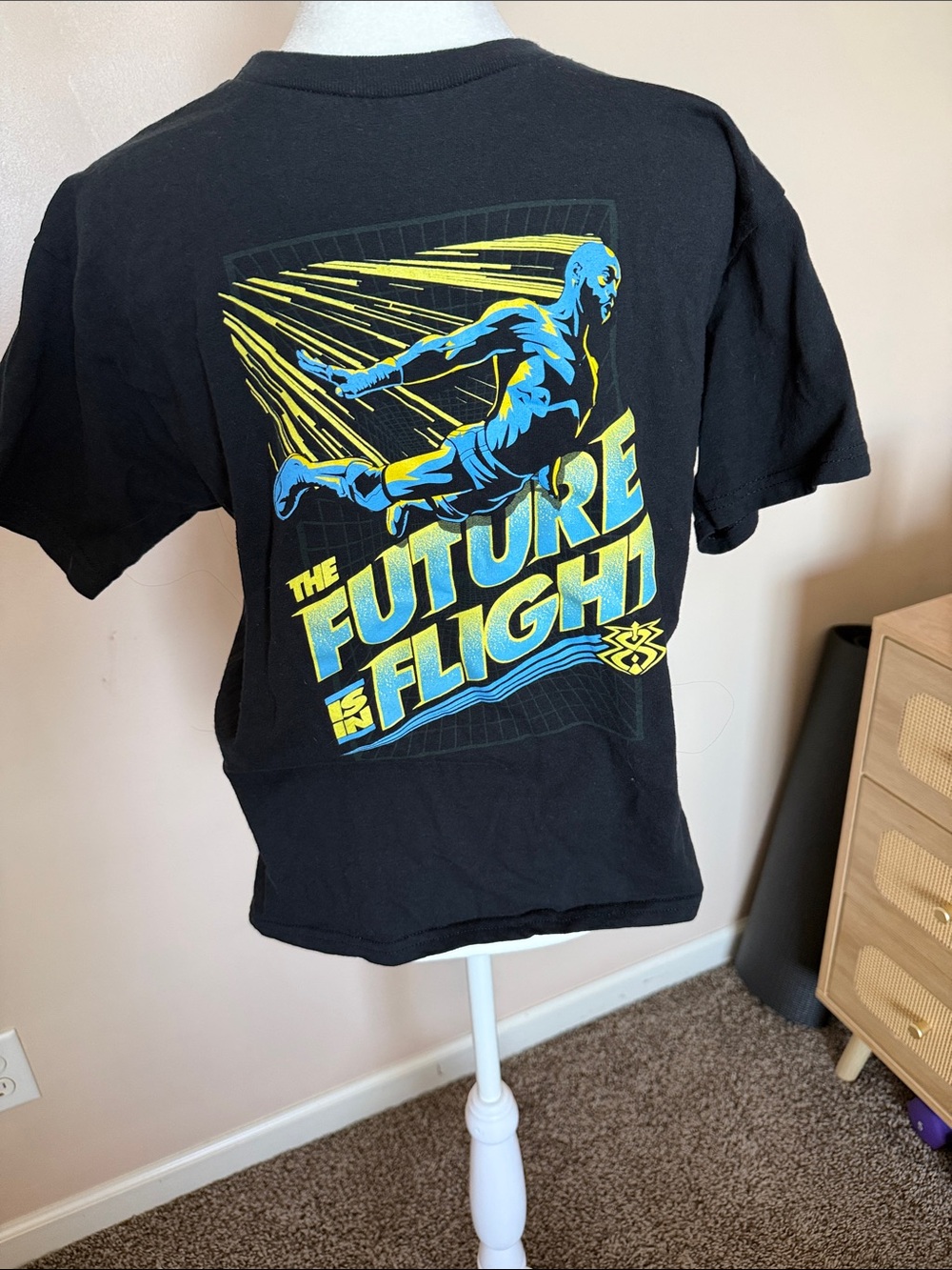 WWE Black Short Sleeve Tee with Blue and Yellow Flight Graphic